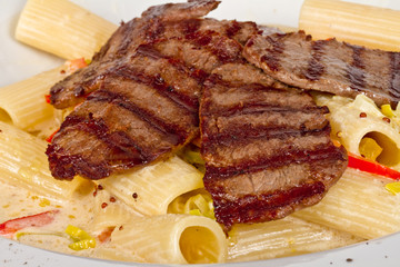 Rigatoni pasta with a beef and sauce