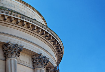 Ornate sandstone columns on government building