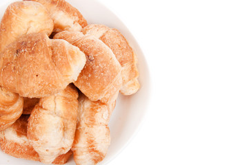 croissant in porcelain plate