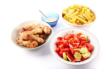 Grilled drumsticks, salad and dressing