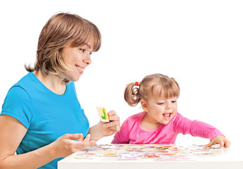 Obraz na płótnie Canvas Mom plays with her daughter