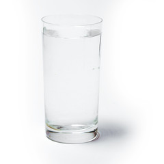 Glass with water on white background