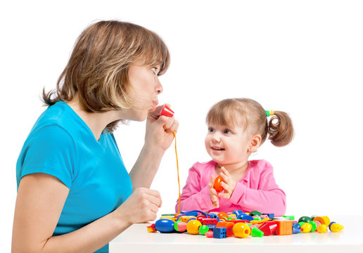 Mom plays with her daughter