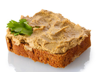Fresh pate on bread isolated on white
