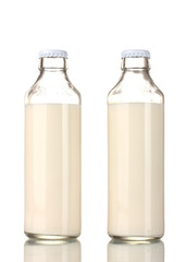 Two bottle of milk isolated on white