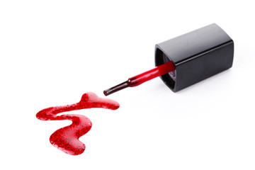 red nail polish and brush isolated on white