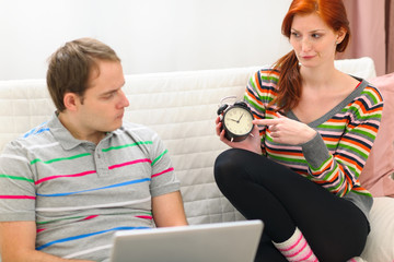 Woman hinting to boyfriend it's time to spend time with her