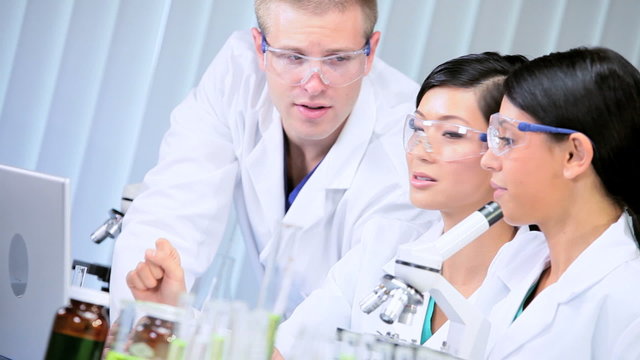 Male Doctor in Laboratory with Medical Students