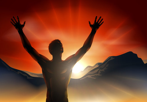 Man in silhouette arms raised on mountain