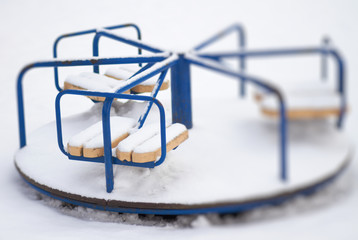 Carousel playground in snow