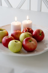 Candles and apples