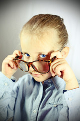 schoolgirl with big glasses blue eye