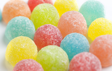 multicolor gummy candy, white backdrop background