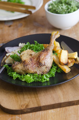 Roast duck with kale and parsnips