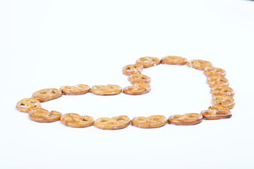 Crispy pretzels stacked in the form of the heart.