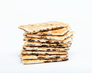 A stack of cookies with caramel filling on a white background.