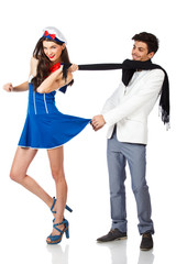 Happy young couple of sailor woman and elegant man