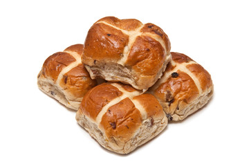 Hot cross buns on a white studio background.