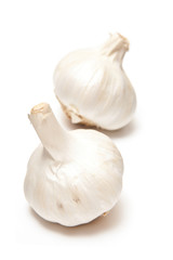 Garlic bulbs iaolated on a white studio background.