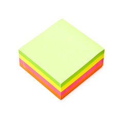 Sticky note pad isolated on a white studio background.