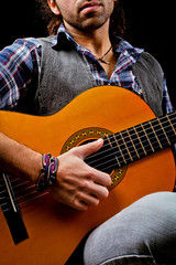 playing acoustic guitar