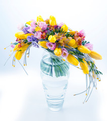 Fresh festive bouquet of flowers in vase on white background