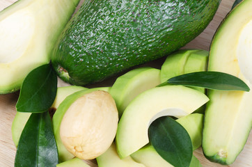 Cut fresh avocado with leaves