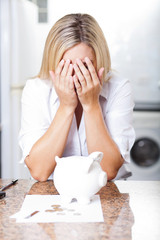 unhappy young woman having financial trouble