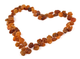 Raisin in form of heart on white background
