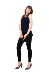 Fototapeta premium Young attractive woman in a black leggings. Isolated