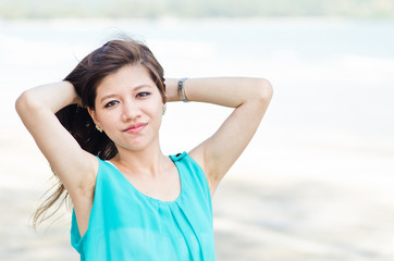 Attractive Asian Woman enjoy on the beach