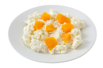 cottage cheese with orange on the plate