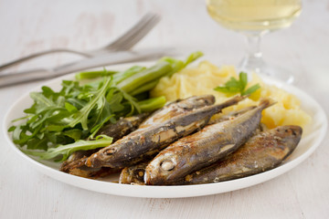fried sardines with mashed potato and green beans