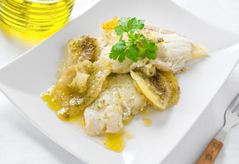 Fish with potatoes.