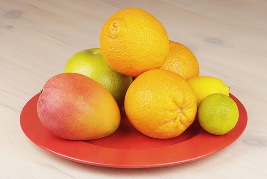 tropical fruit in a plate on the table