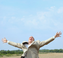 Young emotional person in field