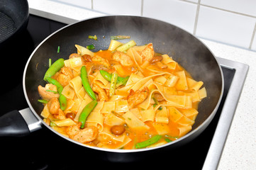 Fresh pasta on a pan.