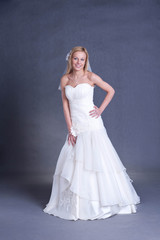 Fototapeta na wymiar young bride in wedding dress