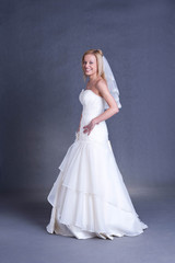 Fototapeta na wymiar young bride in wedding dress