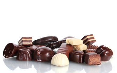 Many different chocolate candy isolated on white