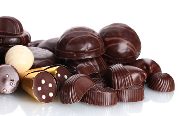 Many different chocolate candy isolated on white