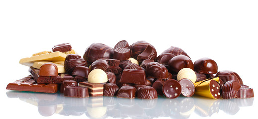 Many different chocolate candy isolated on white