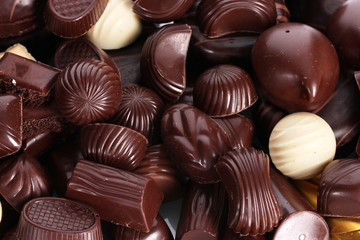 Many different chocolate candy closeup