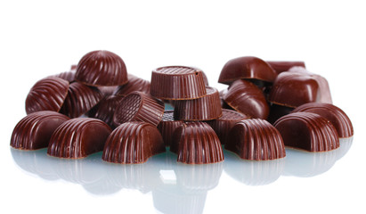 Many different chocolate candy isolated on white