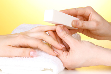 Manicure process in salon