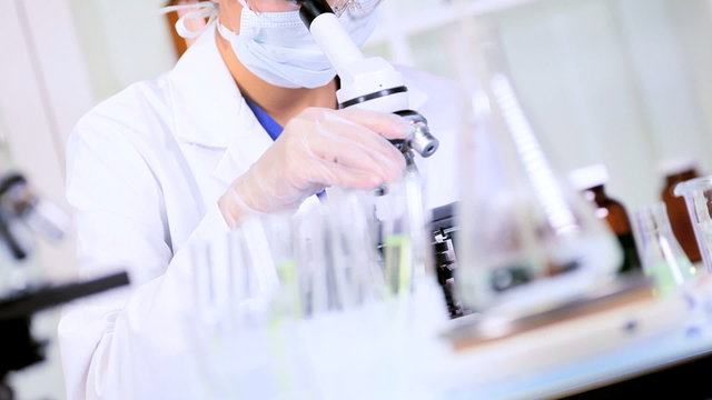 Female Lab Technician Doing Experimental Research