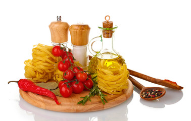 noodles, jar of oil, spices and vegetables