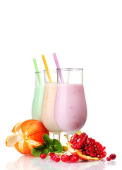 Milk shakes with fruits isolated on white