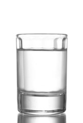Glass of vodka isolated on white