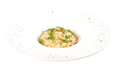 photo of delicious risotto with seafood and dill on it